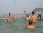 Playing volleyball in the sea